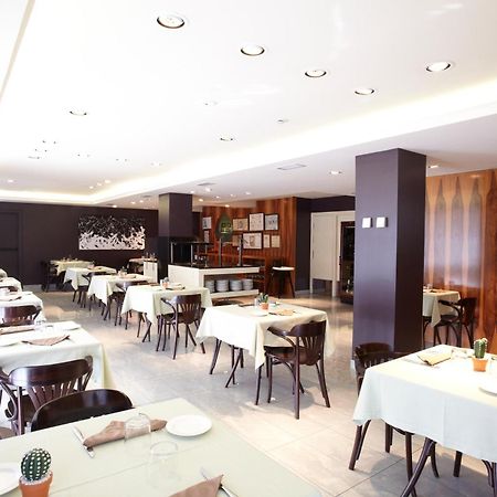 Hotel MU&SPA La Cortinada Restaurant foto